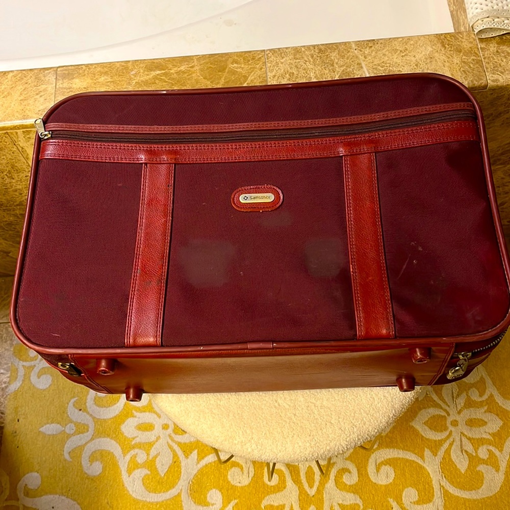Samsonite burgundy Carry-on Luggage